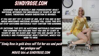 Sindy Rose in gold dress self fist her behind and push prolapse