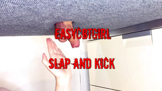 Mistress tickles the slave's balls with her fists and slaps